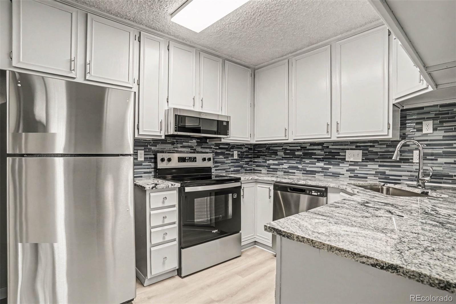 MLS Image #3 for 3460 s poplar street 104,denver, Colorado